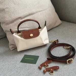 NWT Longchamp white mini bag with leather shoulder strap